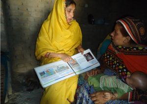 Hygiene Promotion Supervisor Kousar Jahan, 38, delivering hygiene session to a study participant Noor Jahan, 35, at her home in Dadu on 18th May 2016. Noor Jahan’s son Adnan, 6 months old, is a SAM patient.