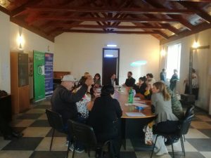 Community leaders discuss access to health services in an IDP settlement in Gori, Georgia.